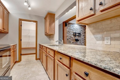 Luxury Golf Course Living with a Fully Finished In-Law Suite on Summergrove Golf Club in Georgia - for sale on GolfHomes.com, golf home, golf lot