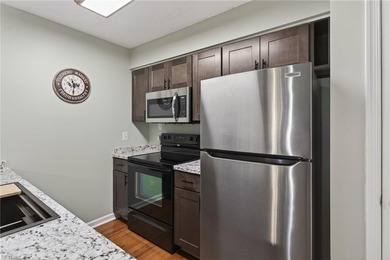 Cozy condo overlooking the golf course in Gleneagles at Kiln on Kiln Creek Golf and Country Club in Virginia - for sale on GolfHomes.com, golf home, golf lot