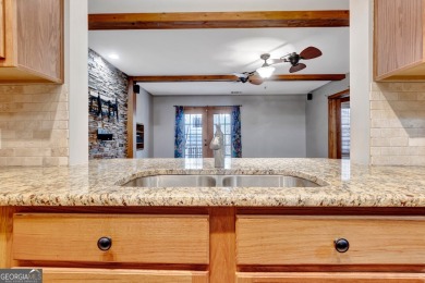 Luxury Golf Course Living with a Fully Finished In-Law Suite on Summergrove Golf Club in Georgia - for sale on GolfHomes.com, golf home, golf lot