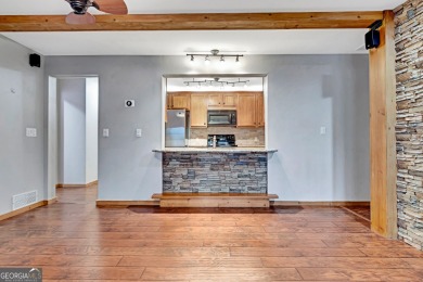 Luxury Golf Course Living with a Fully Finished In-Law Suite on Summergrove Golf Club in Georgia - for sale on GolfHomes.com, golf home, golf lot