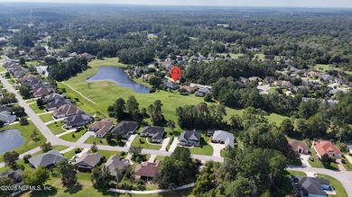 Located in the sought-after Magnolia Point Golf and Country Club on Magnolia Point Golf and Country Club in Florida - for sale on GolfHomes.com, golf home, golf lot