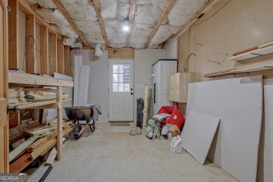 Luxury Golf Course Living with a Fully Finished In-Law Suite on Summergrove Golf Club in Georgia - for sale on GolfHomes.com, golf home, golf lot