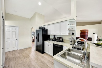 Welcome to this move-in-ready home located in the heart of on Royal Tee Country Club in Florida - for sale on GolfHomes.com, golf home, golf lot