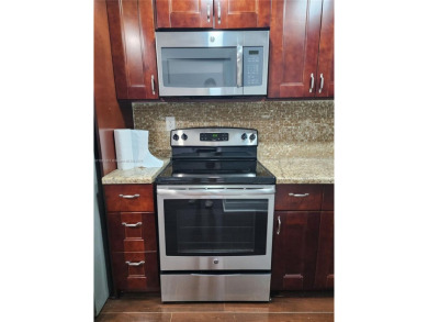 Beautiful 2BR/2BA corner-unit condo in a premier 55+ community on Hollybrook Golf and Tennis Club  in Florida - for sale on GolfHomes.com, golf home, golf lot