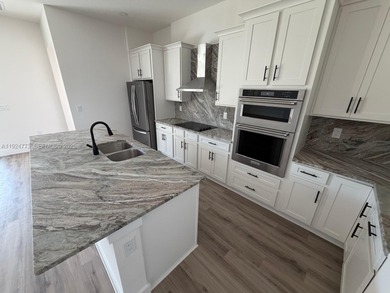 Brand-new house in Placida's sought-after Rotonda Sands on Rotonda Golf and Country Club The Links Course in Florida - for sale on GolfHomes.com, golf home, golf lot