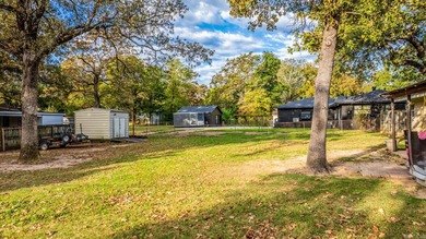 This is your beautifully updated two-bedroom, two-bath home on The Greens At North Hills Country Club in Arkansas - for sale on GolfHomes.com, golf home, golf lot
