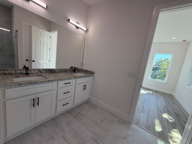 Brand-new house in Placida's sought-after Rotonda Sands on Rotonda Golf and Country Club The Links Course in Florida - for sale on GolfHomes.com, golf home, golf lot