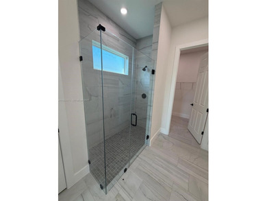 Brand-new house in Placida's sought-after Rotonda Sands on Rotonda Golf and Country Club The Links Course in Florida - for sale on GolfHomes.com, golf home, golf lot