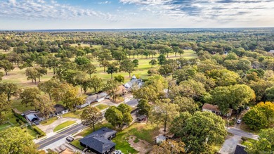 This is your beautifully updated two-bedroom, two-bath home on The Greens At North Hills Country Club in Arkansas - for sale on GolfHomes.com, golf home, golf lot