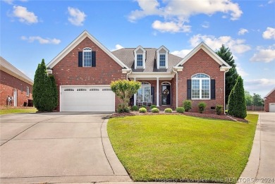 Enjoy this brick home nestled in Cypress Cove Subdivision on Cypress Lakes Golf Course in North Carolina - for sale on GolfHomes.com, golf home, golf lot