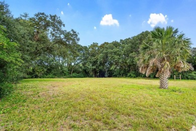 Half acre lot on Porcher Dr. located in the desirable Golf on Whispering Pines in South Carolina - for sale on GolfHomes.com, golf home, golf lot