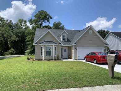 Welcome to single-level living at its finest. This home has 3 on Wedgefield Plantation Golf Club in South Carolina - for sale on GolfHomes.com, golf home, golf lot