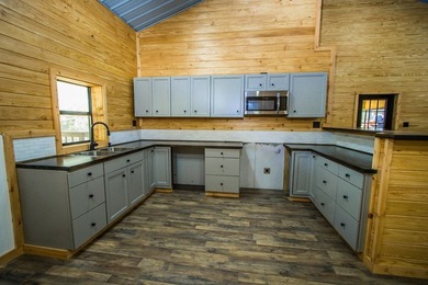 This new construction barndominium in Rayburn Country offers 3 on Rayburn Country Club in Texas - for sale on GolfHomes.com, golf home, golf lot