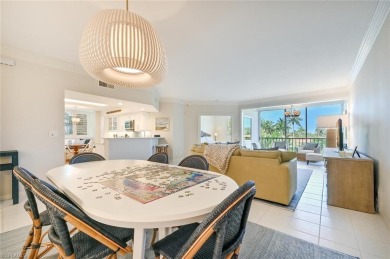 Discover refined coastal living in this rarely available on Club at Pelican Bay Golf Course in Florida - for sale on GolfHomes.com, golf home, golf lot