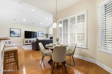 Tucked beneath mature oaks in the gated golf course community of on The Palencia Club in Florida - for sale on GolfHomes.com, golf home, golf lot