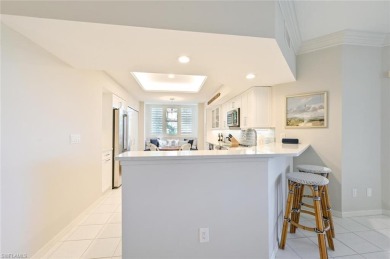 Discover refined coastal living in this rarely available on Club at Pelican Bay Golf Course in Florida - for sale on GolfHomes.com, golf home, golf lot