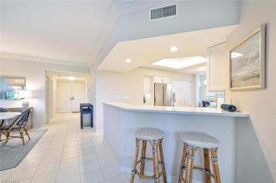 Discover refined coastal living in this rarely available on Club at Pelican Bay Golf Course in Florida - for sale on GolfHomes.com, golf home, golf lot