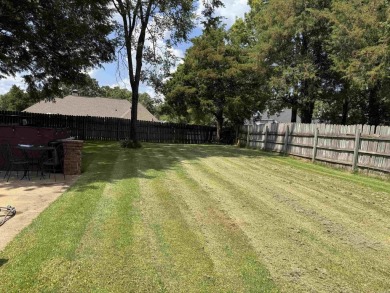 RIVER OAKS CHARMER with a beautiful in-ground pool area! Located on The Course at River Oaks in Arkansas - for sale on GolfHomes.com, golf home, golf lot