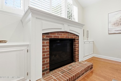 Tucked beneath mature oaks in the gated golf course community of on The Palencia Club in Florida - for sale on GolfHomes.com, golf home, golf lot