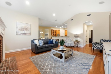 Tucked beneath mature oaks in the gated golf course community of on The Palencia Club in Florida - for sale on GolfHomes.com, golf home, golf lot