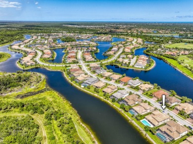 This residence is thoughtfully designed for seamless on Jupiter Country Club in Florida - for sale on GolfHomes.com, golf home, golf lot