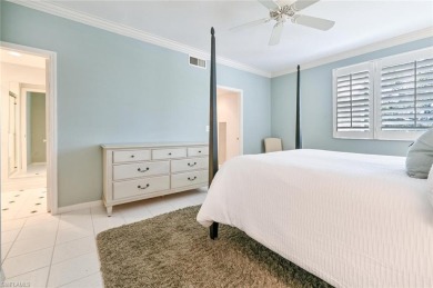 Discover refined coastal living in this rarely available on Club at Pelican Bay Golf Course in Florida - for sale on GolfHomes.com, golf home, golf lot