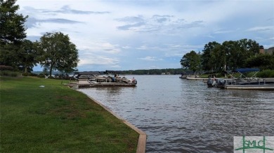 LAKE OCONEE HOME WITH DESIGNATED SLIP, BOAT DOCK  ROOM FOR A on The Golf Club at Cuscowilla in Georgia - for sale on GolfHomes.com, golf home, golf lot