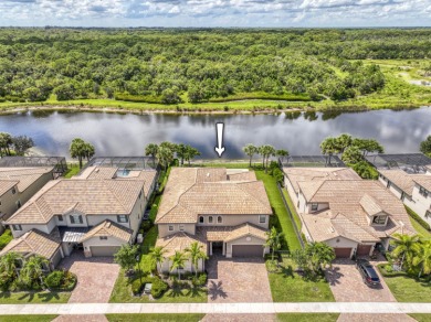 This residence is thoughtfully designed for seamless on Jupiter Country Club in Florida - for sale on GolfHomes.com, golf home, golf lot