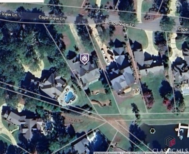 LAKE OCONEE HOME WITH DESIGNATED SLIP, BOAT DOCK & ROOM FOR A on The Golf Club at Cuscowilla in Georgia - for sale on GolfHomes.com, golf home, golf lot
