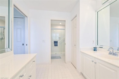 Discover refined coastal living in this rarely available on Club at Pelican Bay Golf Course in Florida - for sale on GolfHomes.com, golf home, golf lot