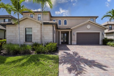 This residence is thoughtfully designed for seamless on Jupiter Country Club in Florida - for sale on GolfHomes.com, golf home, golf lot