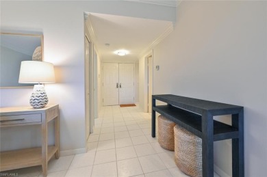 Discover refined coastal living in this rarely available on Club at Pelican Bay Golf Course in Florida - for sale on GolfHomes.com, golf home, golf lot