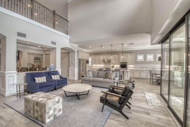 This residence is thoughtfully designed for seamless on Jupiter Country Club in Florida - for sale on GolfHomes.com, golf home, golf lot