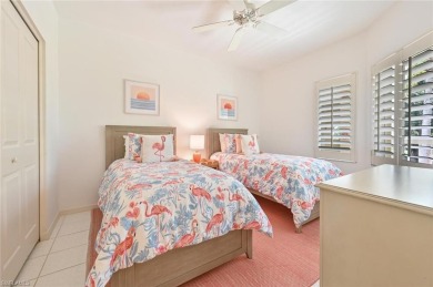Discover refined coastal living in this rarely available on Club at Pelican Bay Golf Course in Florida - for sale on GolfHomes.com, golf home, golf lot