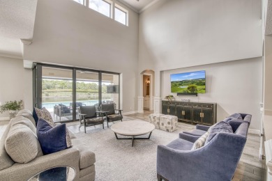 This residence is thoughtfully designed for seamless on Jupiter Country Club in Florida - for sale on GolfHomes.com, golf home, golf lot