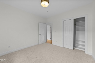 Welcome to 10410 Rosegate Court #307 - a stunning top-floor on Brier Creek Country Club in North Carolina - for sale on GolfHomes.com, golf home, golf lot