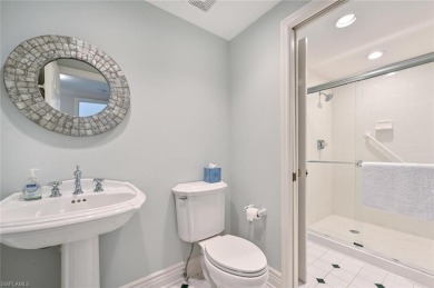 Discover refined coastal living in this rarely available on Club at Pelican Bay Golf Course in Florida - for sale on GolfHomes.com, golf home, golf lot