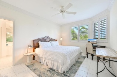 Discover refined coastal living in this rarely available on Club at Pelican Bay Golf Course in Florida - for sale on GolfHomes.com, golf home, golf lot
