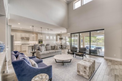 This residence is thoughtfully designed for seamless on Jupiter Country Club in Florida - for sale on GolfHomes.com, golf home, golf lot