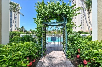 Discover refined coastal living in this rarely available on Club at Pelican Bay Golf Course in Florida - for sale on GolfHomes.com, golf home, golf lot