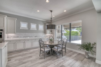 This residence is thoughtfully designed for seamless on Jupiter Country Club in Florida - for sale on GolfHomes.com, golf home, golf lot