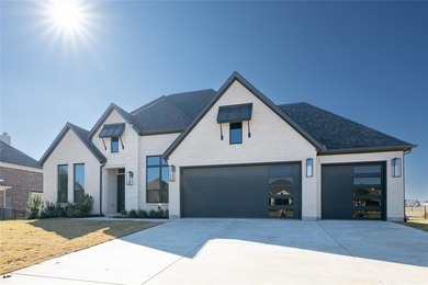 This completed Haynes Homes custom sits on a half-acre lot in on The Bridges Golf Club in Texas - for sale on GolfHomes.com, golf home, golf lot