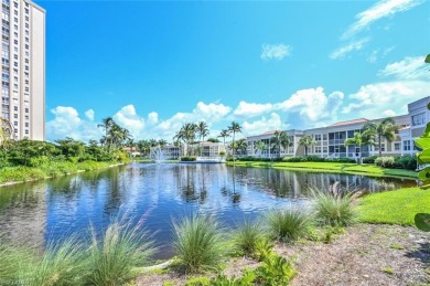 Discover refined coastal living in this rarely available on Club at Pelican Bay Golf Course in Florida - for sale on GolfHomes.com, golf home, golf lot
