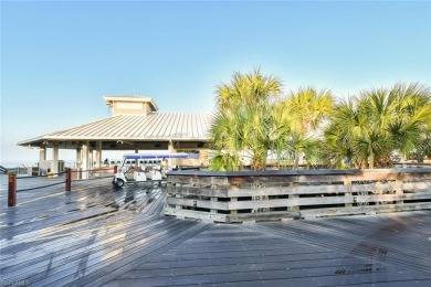 Discover refined coastal living in this rarely available on Club at Pelican Bay Golf Course in Florida - for sale on GolfHomes.com, golf home, golf lot
