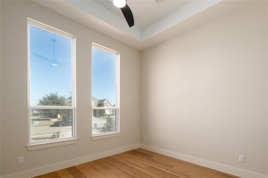 This completed Haynes Homes custom sits on a half-acre lot in on The Bridges Golf Club in Texas - for sale on GolfHomes.com, golf home, golf lot