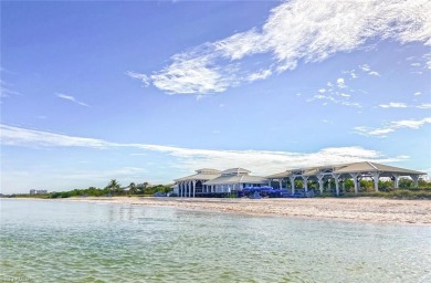 Discover refined coastal living in this rarely available on Club at Pelican Bay Golf Course in Florida - for sale on GolfHomes.com, golf home, golf lot