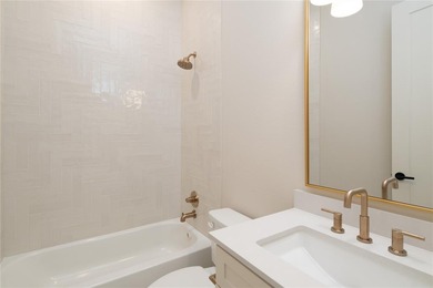 This completed Haynes Homes custom sits on a half-acre lot in on The Bridges Golf Club in Texas - for sale on GolfHomes.com, golf home, golf lot