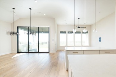 This completed Haynes Homes custom sits on a half-acre lot in on The Bridges Golf Club in Texas - for sale on GolfHomes.com, golf home, golf lot