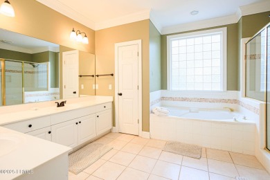 Discover your dream retreat in the prestigious Ocean Creek on Ocean Creek Golf Course in South Carolina - for sale on GolfHomes.com, golf home, golf lot