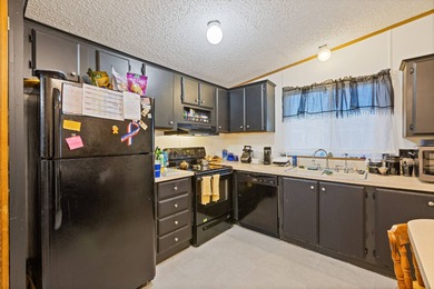 This charming 2 bedroom, 2 bath home offers 1,248 sq ft of on Painted Mountain Golf Club in Arizona - for sale on GolfHomes.com, golf home, golf lot